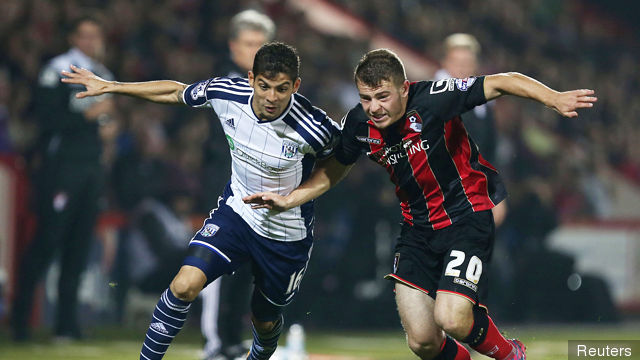 Bournemouth's Ryan Fraser in action against West Brom's Christian Gamboa