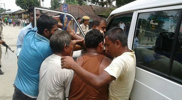 Locals tried to get the injured from the scene. Source Nilim Dutta