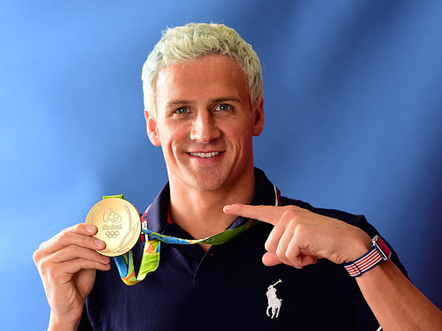 US gold medallist Ryan Lochte robbed at gunpoint in Rio: report