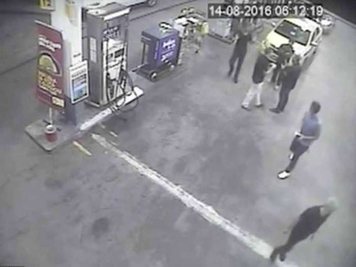 In this Sunday Aug. 14 2016 frame from surveillance video released by Brazil Police swimmers from the United States Olympic team appear with Ryan Lochte right at a gas station during the 2016 Summer Olympics in Rio de Janeiro Brazil. A top Brazil