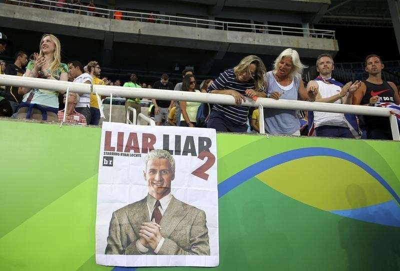 2016 Rio Olympics- Athletics- Final- Men's Decathlon Javelin Throw- Groups- Olympic Stadium- Rio de Janeiro Brazil- 18/08/2016. A poster showing a likeness of Ryan Lochte of USA is seen at the stadium. REUTERS  Dominic Ebenbichler