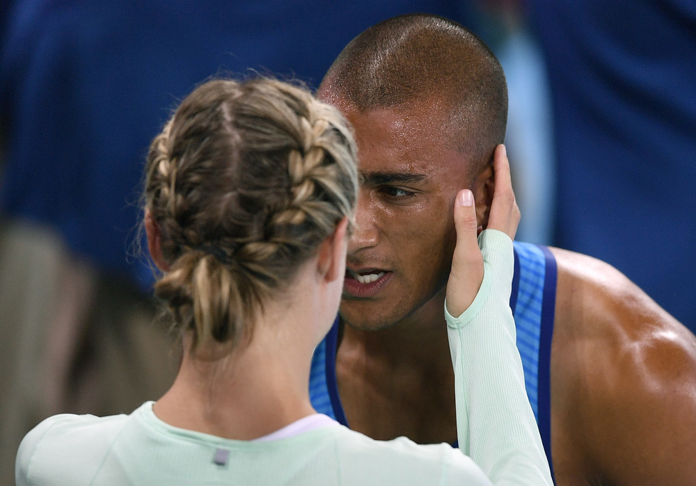 Eaton embraces his wife Brianne Theisen Eaton immediately after winning the gold in the decathlon in Rio on Thursday. His wife a Canadian won bronze in the heptathlon last week