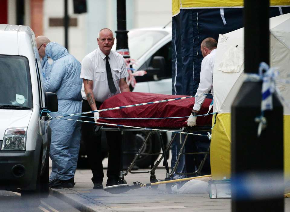 Woman killed 5 hurt in London knife attack suspect held