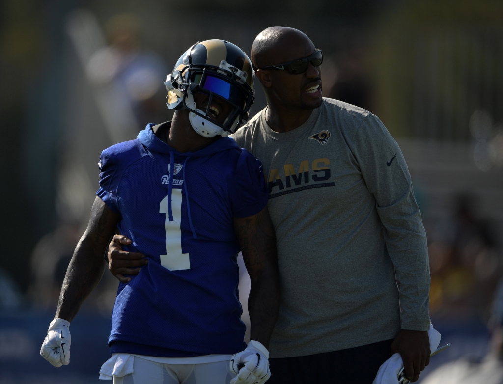 Jul 31 2016 Irvine CA USA Los Angeles Rams receiver Tavon Austin is assisted by athletic trainer Reggie Scott after suffering an injury at training camp at UC Irvine. Mandatory Credit Kirby Lee-USA TODAY Sports