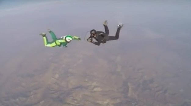 Skydiver makes final preparations to jump without parachute