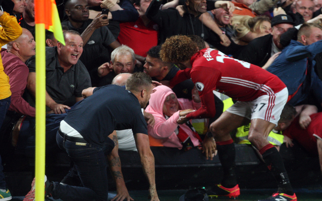 Marouane Fellaini takes on hero status after rushing to help trapped Manchester United fan in celebrations at Hull