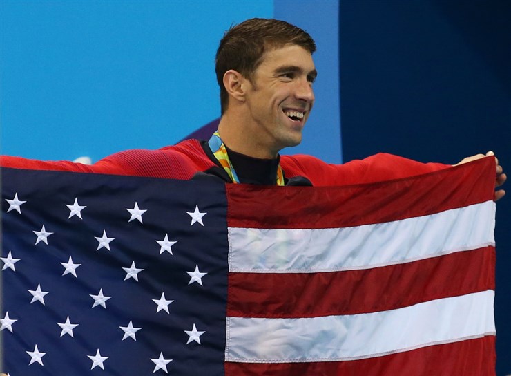 MARCOS BRINDICCI   Michael Phelps of the U.S. celebrates his team's gold in the 400 medley relay on Saturday. It was his 23rd career gold medal