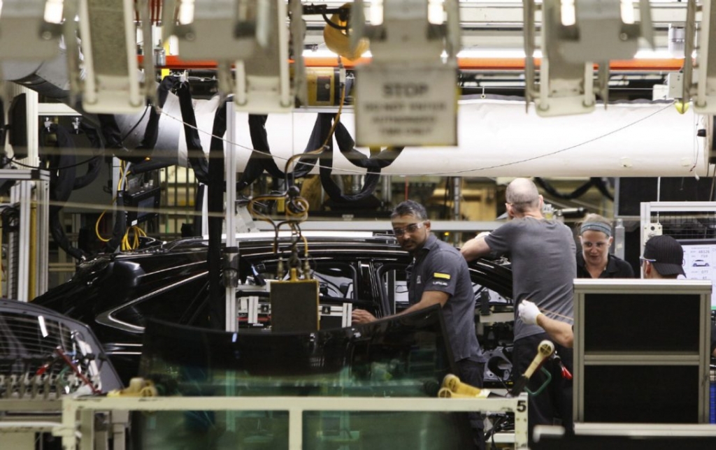 Workers assemble a Lexus SUV at the Cambridge Ont. Toyota plant. Ontario and Michigan are planning to join efforts in making their auto industries more competitive as more production has shifted to the southern U.S. and Mexico