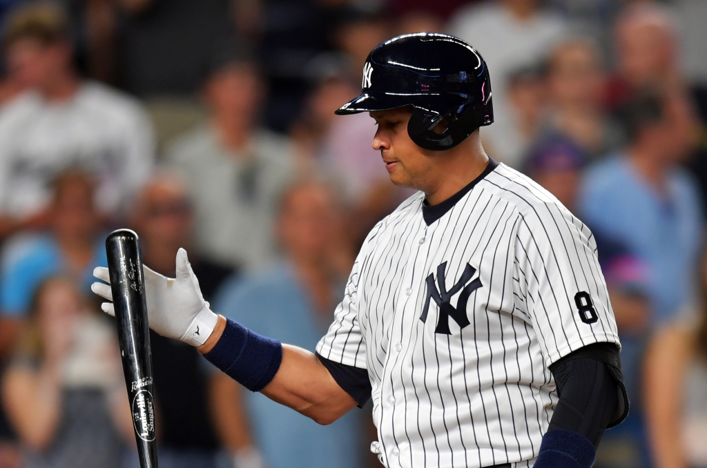 Alex Rodriguez #13 of the New York Yankees reacts after striking out in the fifth inning against the Tampa Bay Rays at Yankee Stadium