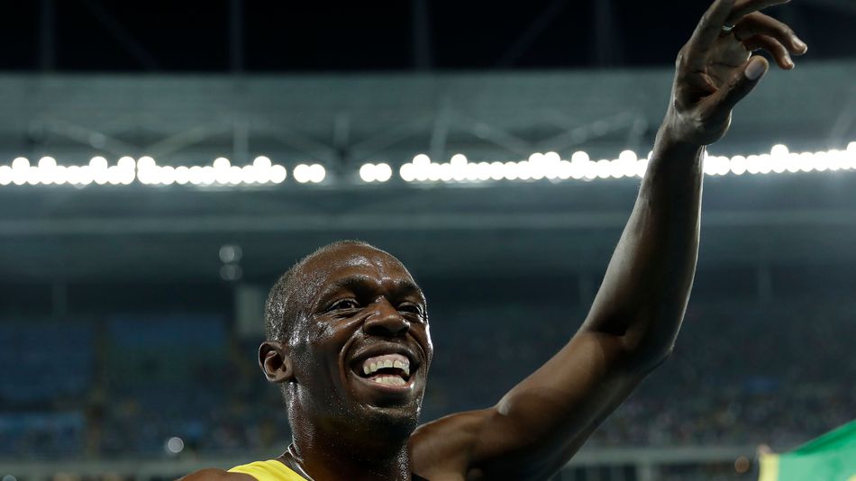 Jamaica's Usain Bolt celebrates winning gold in the men's 4 x 100-meter relay final during the 2016 Summer Olympics in Rio de Janeiro Brazil Friday Aug. 19 2016