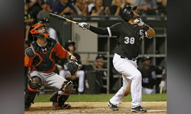 Chicago White Sox's Omar Narvaez right watches after hitting a one-run single as Baltimore Orioles catcher Caleb Joseph watches on during the seventh inning of a baseball game in Chicago Saturday Aug. 6 2016