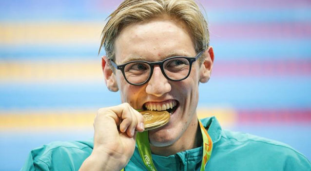 Mack Horton and his gold medal. Source 7News