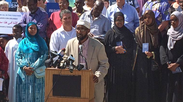 Mahmoud Hassan a member of the Somali community in Portland speaks at a rally Friday Aug. 5 2016 in Portland Maine