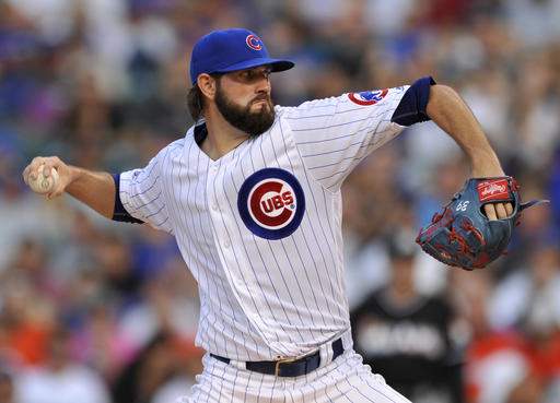 Hammel, Chapman pitch Cubs past Fernandez, Marlins 3-2