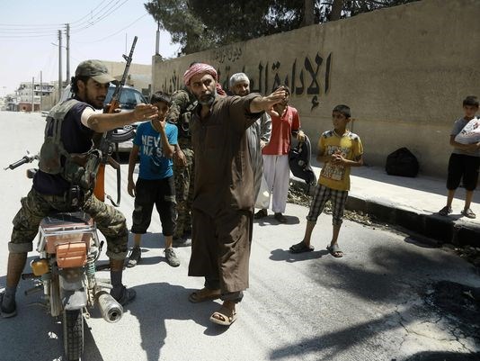 Isis 'abducts 2000 civilians to use as human shields' while fleeing Manbij