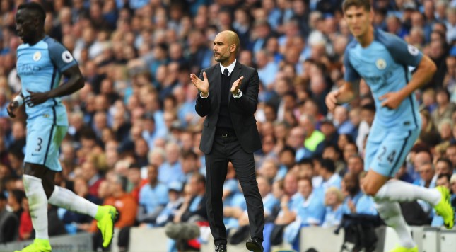 MANCHESTER ENGLAND- AUGUST 13 Josep Guardiola Manager of Manchester City claps his team on during the Premier League match between Manchester City and Sunderland at Etihad Stadium