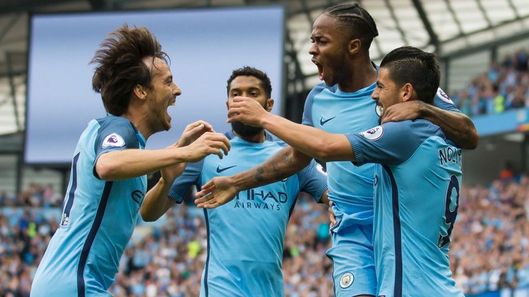 Manchester City midfielder Raheem Sterling celebrates after scoring against West Ham