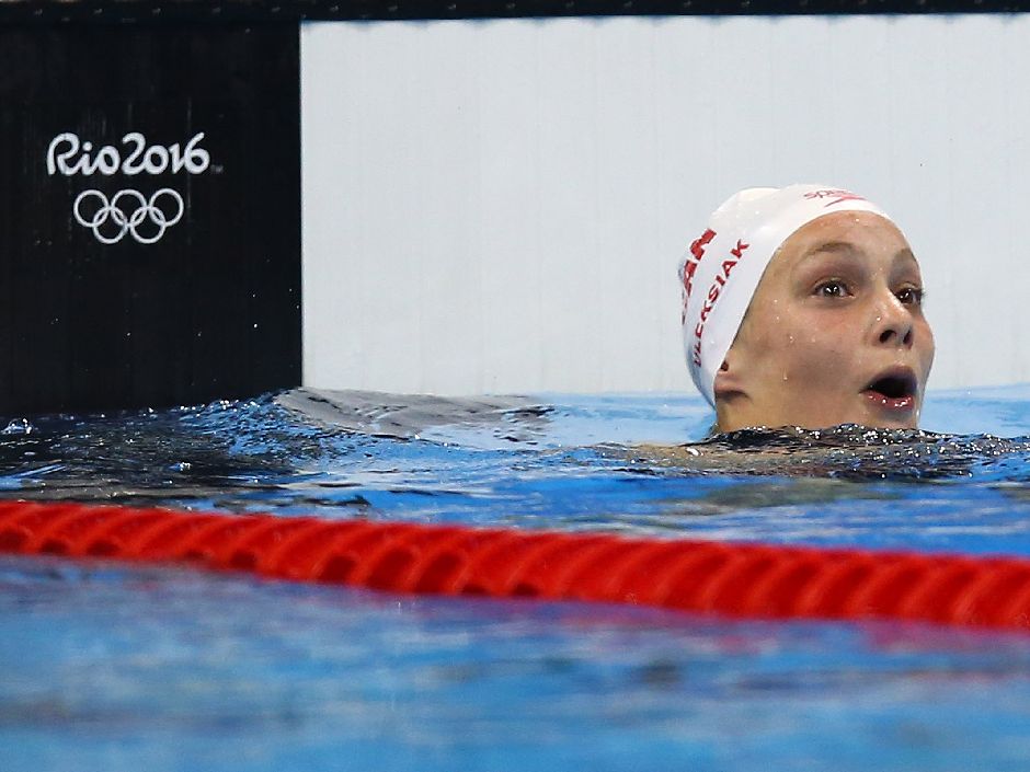 Penny Oleksiak shows her surprise at tying for the gold medal in the women's 100-metre freestyle on Thursday