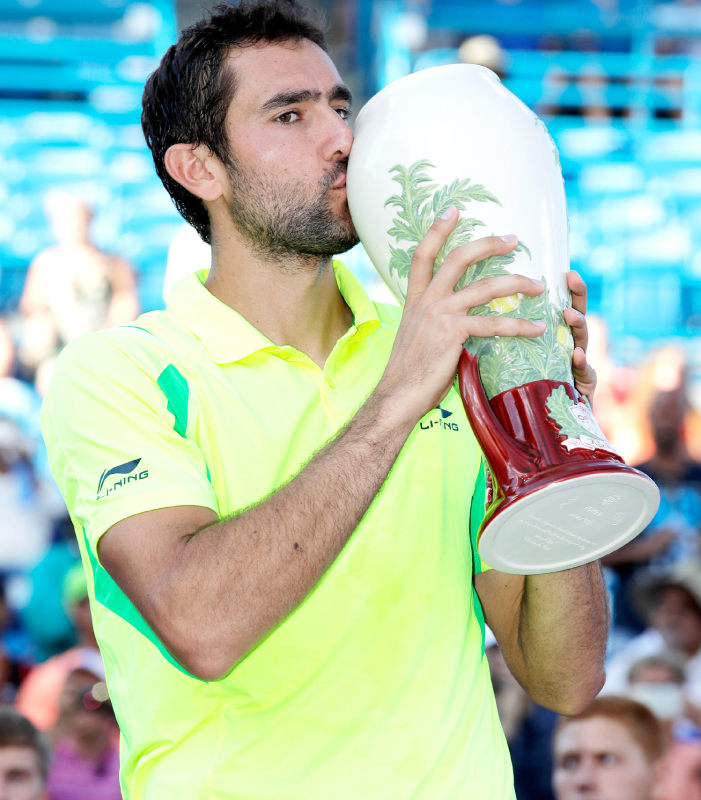 Marin Cilic of Croatia kisses the winner’s trophy after beating Andy Murray in the championship match in Mason Ohio Sunday. — AFP