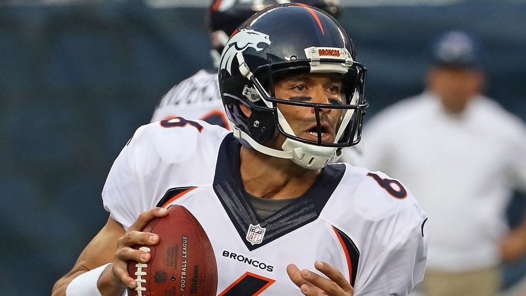 Mark Sanchez #6 of the Denver Broncos looks for a receiver against the Chicago Bears at Soldier Field