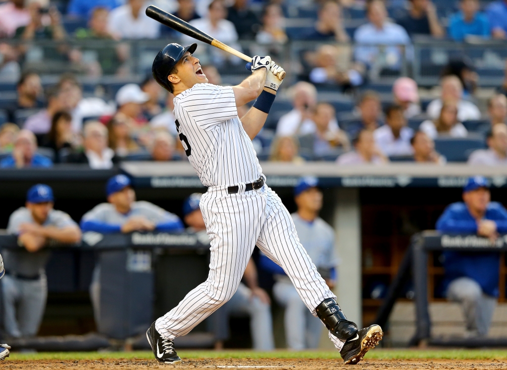 Mark Teixeira reacts after he flies out to end the third inning against the Kansas City Royals