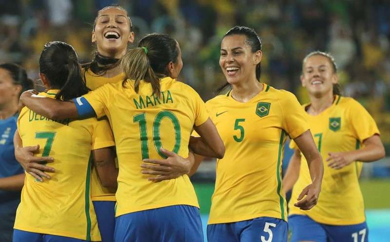 2016 Rio Olympics- Soccer- Preliminary- Women's First Round- Group E Brazil v Sweden- Olympic Stadium- Rio de Janeiro Brazil- 06/08/2016. Marta of Brazil celebrates with teammates after scoring their fourth goal. REUTERS  Gonzalo Fuentes