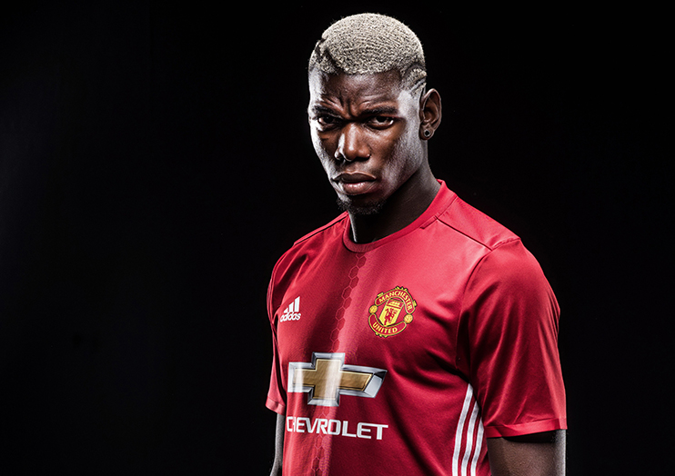 MANCHESTER ENGLAND- AUGUST 08  Paul Pogba of Manchester United poses after signing for the club at Aon Training Complex on Augu