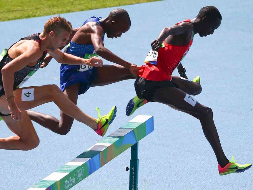 Matthew Hughes of Canada Hillary Bor of USA and Ezekiel Kemboi of Kenya compete. REUTERS  David Gray