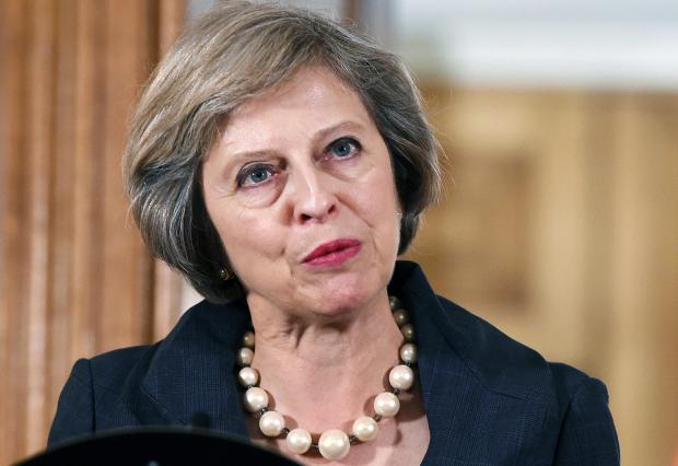 May cautious on Brexit route as Rome urges clear timeline