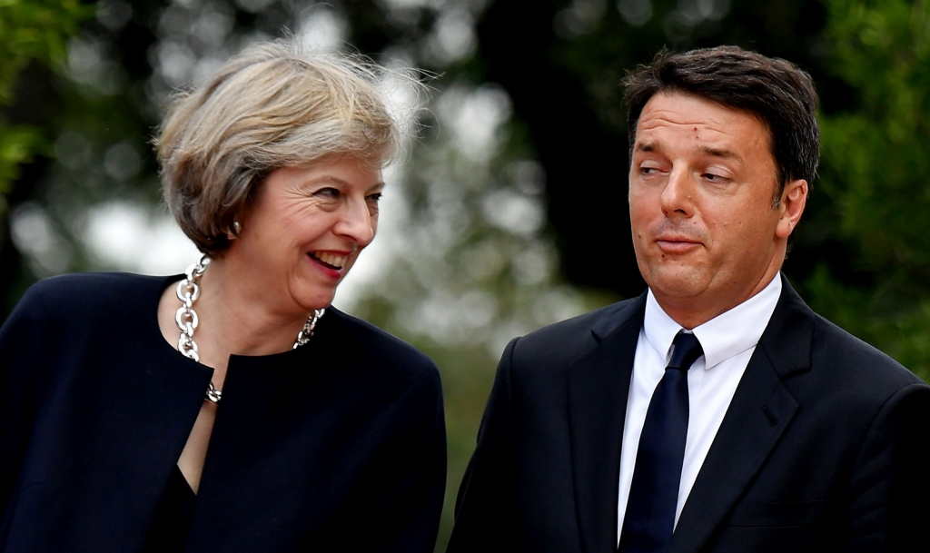 Italian Prime Minister Matteo Renzi welcomes British Prime Minister Theresa May in the garden of Villa Doria Pamphili prior to a meeting in Rome