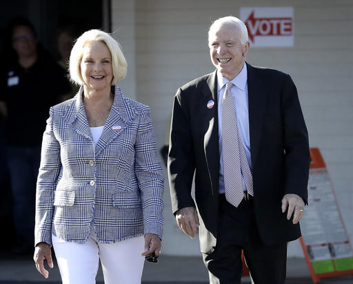 U.S. Sen. John McCain R-Ariz. and his wife Cindy McCain leave a polling station after voting Tuesday Aug. 30 2016 in Phoenix. Mc Cain is seeking the Republican nomination in Arizona's primary election