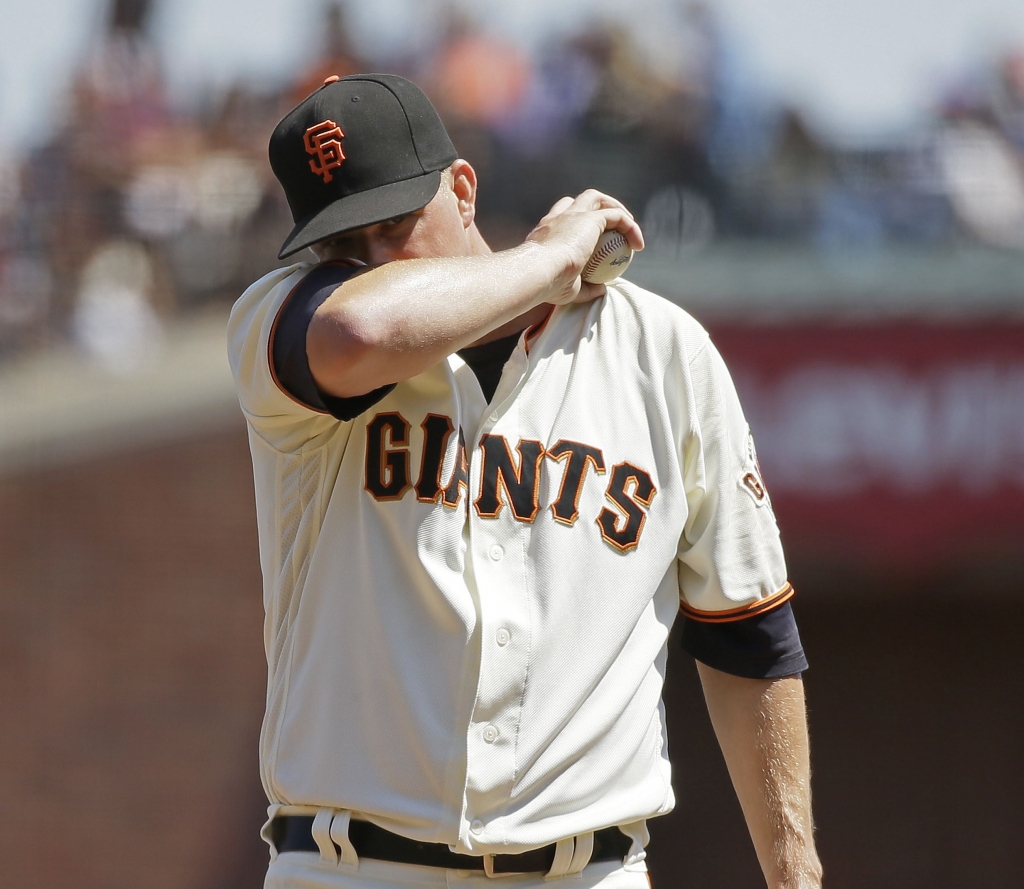 Pirates Giants Baseball Giants starting pitcher Matt Cain stands on the mound before being removed by manager Bruce Bochy in the fifth inning Wednesday at AT&T Park