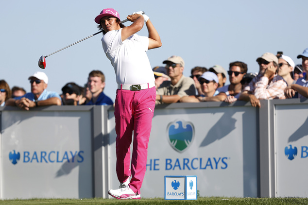 Rickie Fowler hits a tee shot on the 17th hole during the third round of The Barclays golf tournament in Jersey Cit