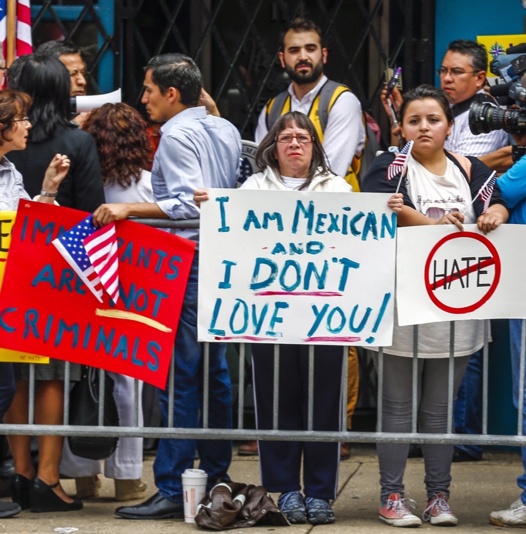 Members of the Mexican community protest against Donald Trump in Chicago