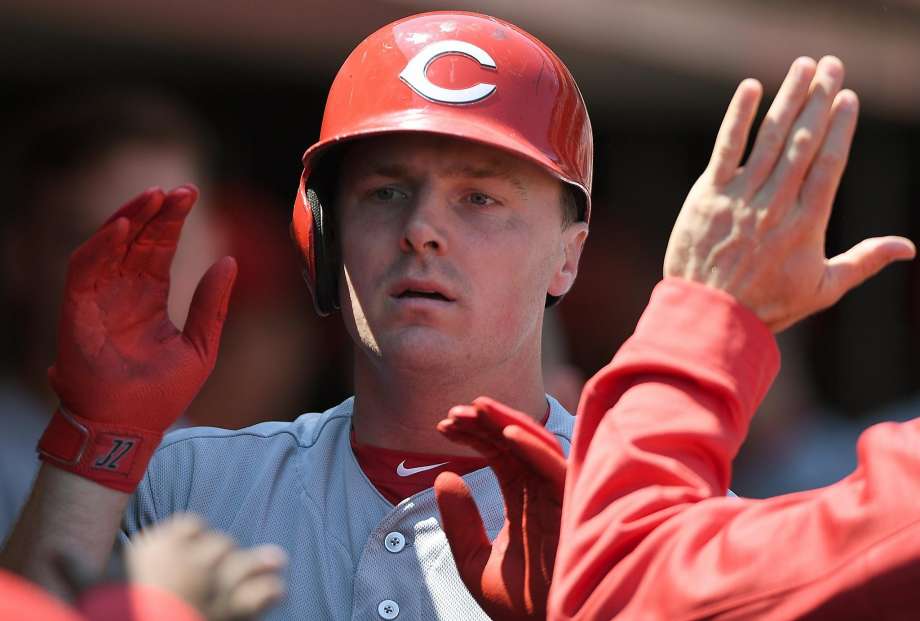 SAN FRANCISCO CA- JULY 27 Jay Bruce #32 of the Cincinnati Reds is congratulated by teammates after he hit a solo home run against the San Francisco Giants in the top of the seventh inning at AT&T Park