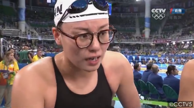 Fu Yuanhui speaks to a reporter after competing in the 4x100-meter medley relay this past Saturday