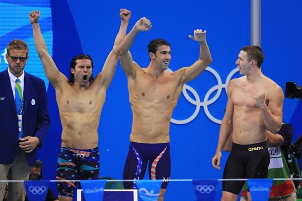 Cody Miller Michael Phelps and Ryan Murphy of the United States celebrate winning gold in the Men's 4 x 100m Medley Relay Final on Day 8 of the Rio 2016 Olympic Games