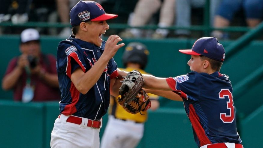 Michael Mancini left celebrates with Jude Abbadessa during the U.S. championship game of the Little League World Series