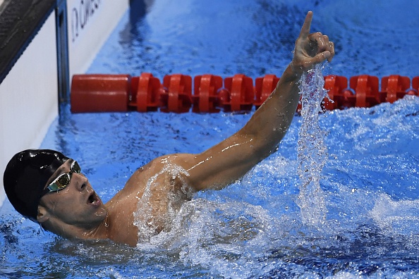 USA's Michael Phelps celebrates after Team USA won the Men's 4x200m Freestyle Relay Final during the swimming event at the Rio 2016 Olympic Games at the Olympic Aquatics Stadium in Rio de Janeiro