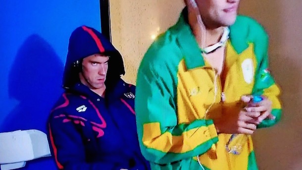 Michael Phelps Snags His First Gold Medal Of The Rio Olympics As Son Boomer Looks On!