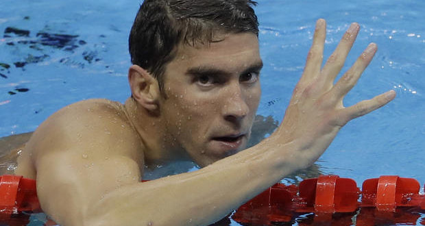 Michael Phelps' Son Boomer Steals the Show Again As Phelps Wins 20th Gold Medal — See Boomer's Own Game Face!