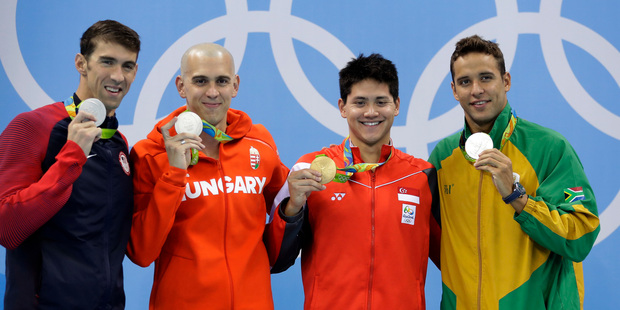 United States silver medal winner Michael Phelps Hungary's silver medal winner Laszlo Cseh Singapore's gold medal winner Joseph Schooling and South Africa's silver medal winner Chad Le Clos from left in the men's 100-meter butterfly medals ceremony