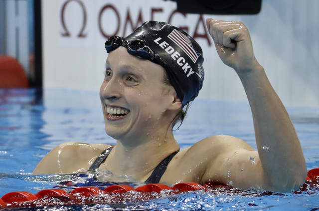 ASSOCIATED PRESS           Unites States’ Katie Ledecky celebrates after winning gold in the women’s 800-meter freestyle final during the swimming competitions at the 2016 Summer Olympics today in Rio de Janeiro Brazil