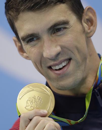 Michael Phelps celebrates with his 23rd career Olympic gold medal on Saturday night in Rio