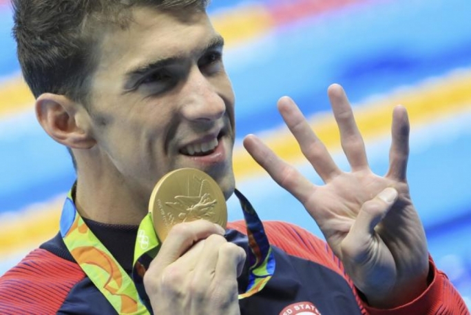 Michael Phelps celebrates