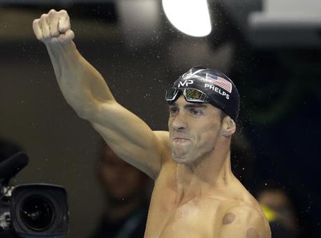 United States&#039 Michael Phelps celebrates after winning the gold medal during the swimming competitions at the 2016 Summer Olympics Tuesday Aug. 9 2016 in Rio de Janeiro Brazil