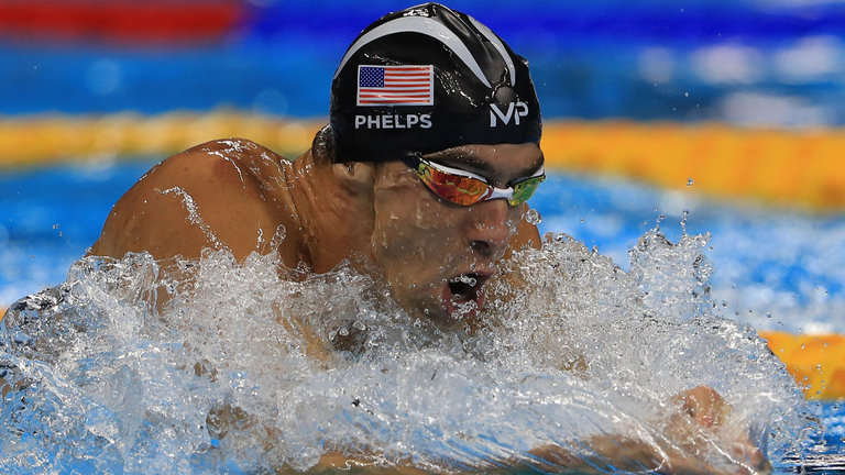 Michael Phelps is Olympic 200m IM champion for the fourth successive Games