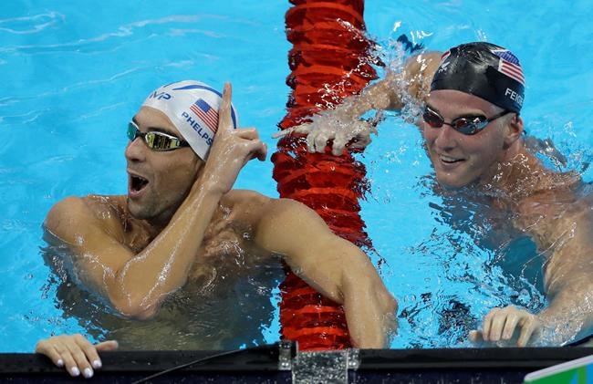 United States&#39 Michael Phelps left jokes with his teammate James Feigen during a swimming training session prior to the 2016 Summer Olympics in Rio de Janeiro Brazil Tuesday Aug. 2 2016