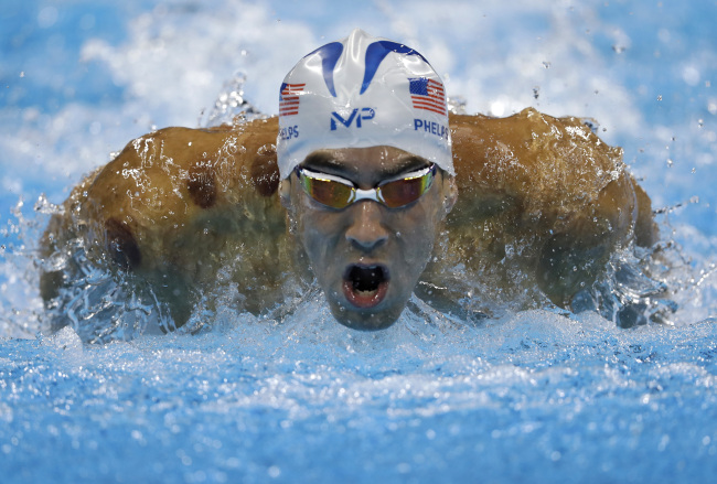 Michael Phelps among Olympians covered in large red circles from ancient healing technique of 'cupping'