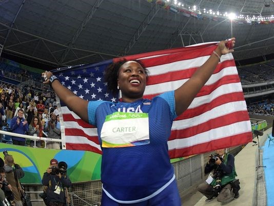 Michelle Carter celebrates her victory in the shot put